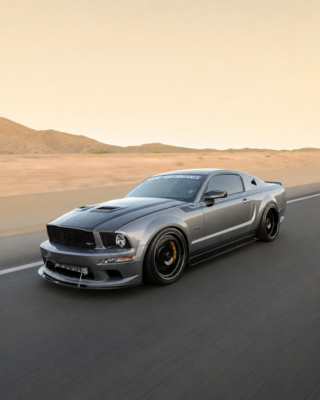 MPR Performance’s silver 2007 Ford Mustang GT driving on a desert road