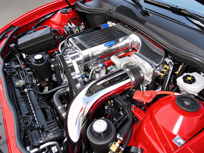AI-enhanced illustration based on a Kenne Bell Mammoth installation in a red 2010–2014 Chevrolet Camaro; actual configuration varies