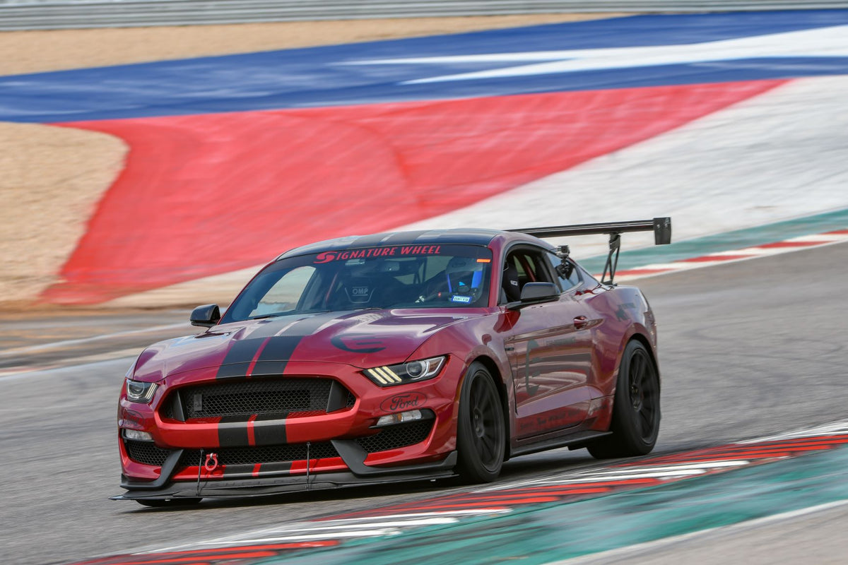 APR GT-250 adjustable carbon fiber rear wing for 2015–17 Ford Mustang